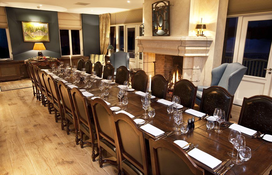 The private dining room, set by the fire